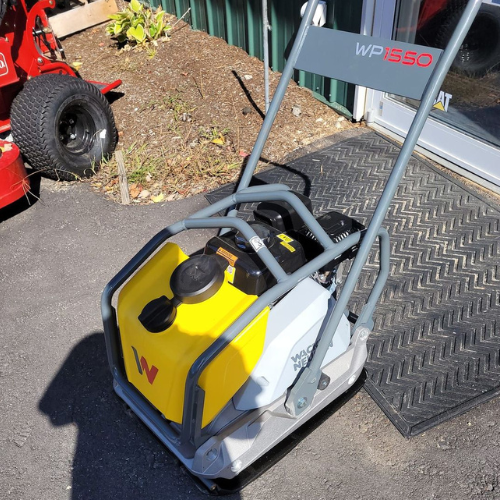 A yellow and gray machine that says wp550 on it