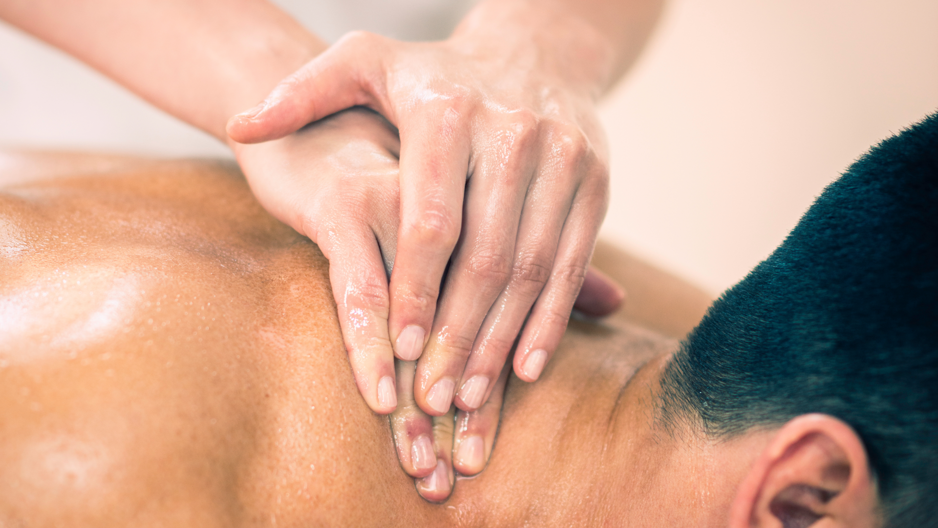 A man is getting a massage at a spa.