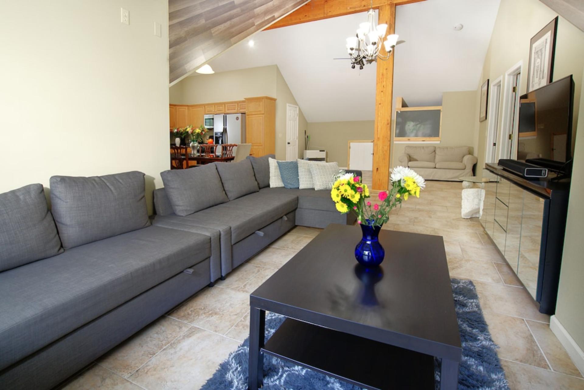 A living room with a couch and a coffee table