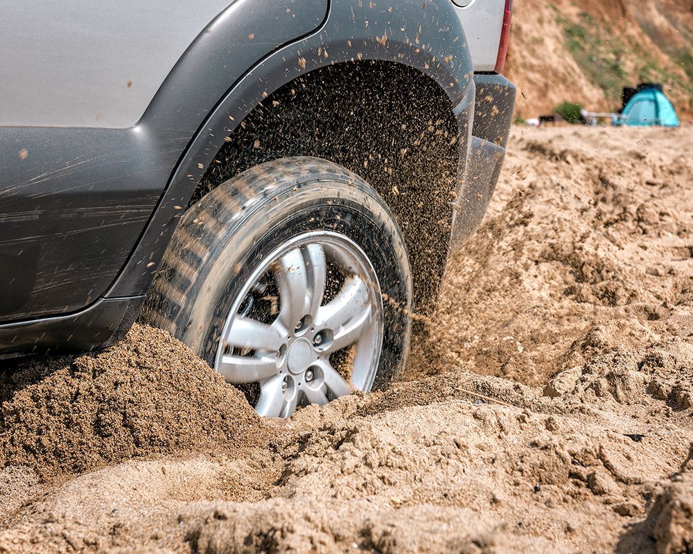 Black SUV Being Stuck on Mud