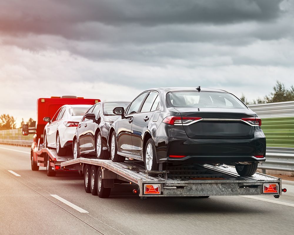 Flatbed Truck Trasporting Cars