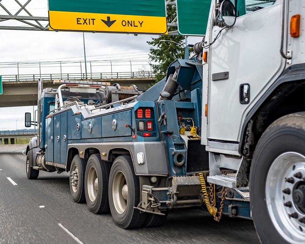 Tow Truck Towing Large Truck