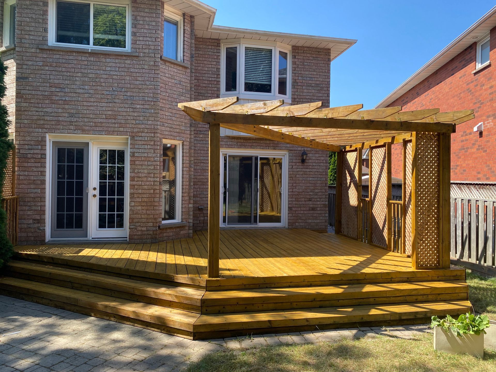 After: Deck staining & updated privacy screen