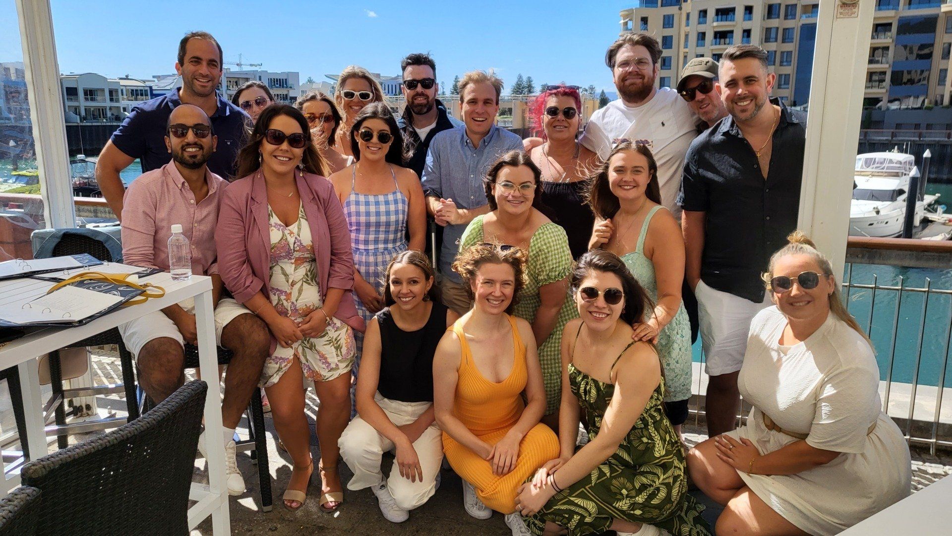 A group of people are posing for a picture together.