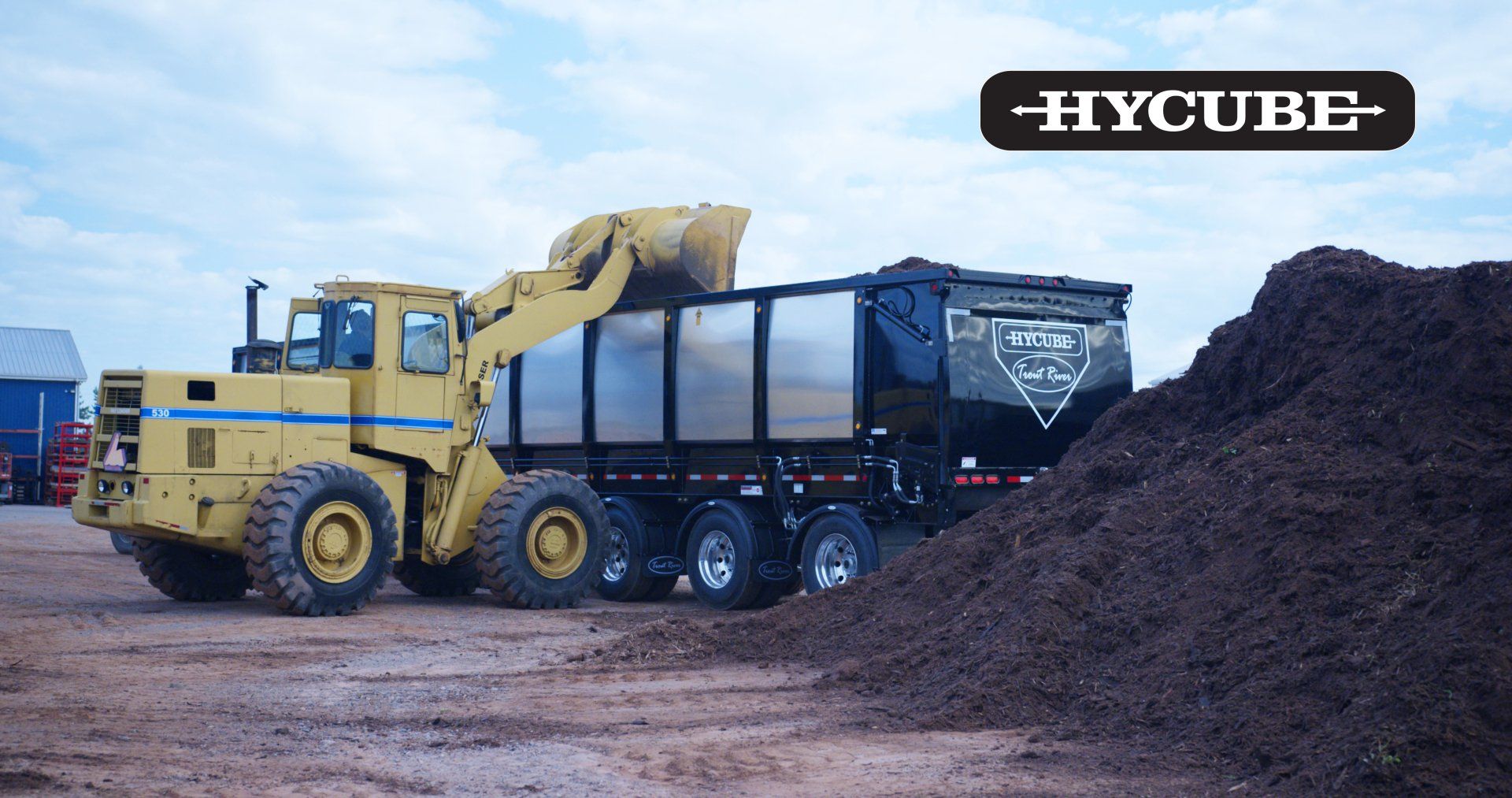 Trout River Industries Hycube trailer being loaded