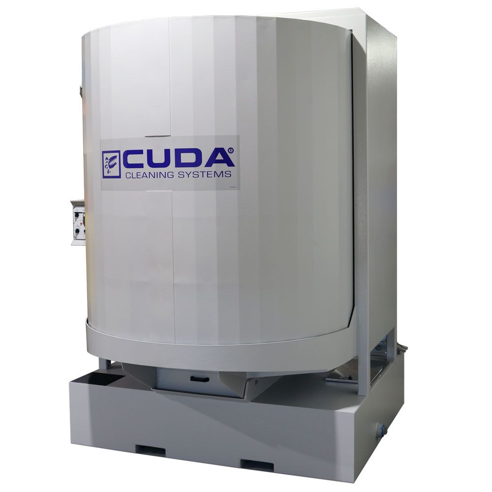 Large gray CUDA cleaning system machine on a platform, viewed from the front-left.