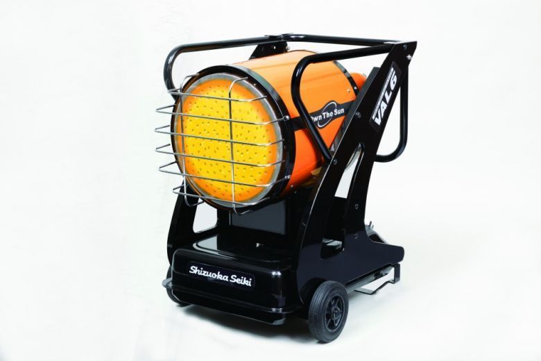 Portable black-and-orange space heater with a circular fan on wheels