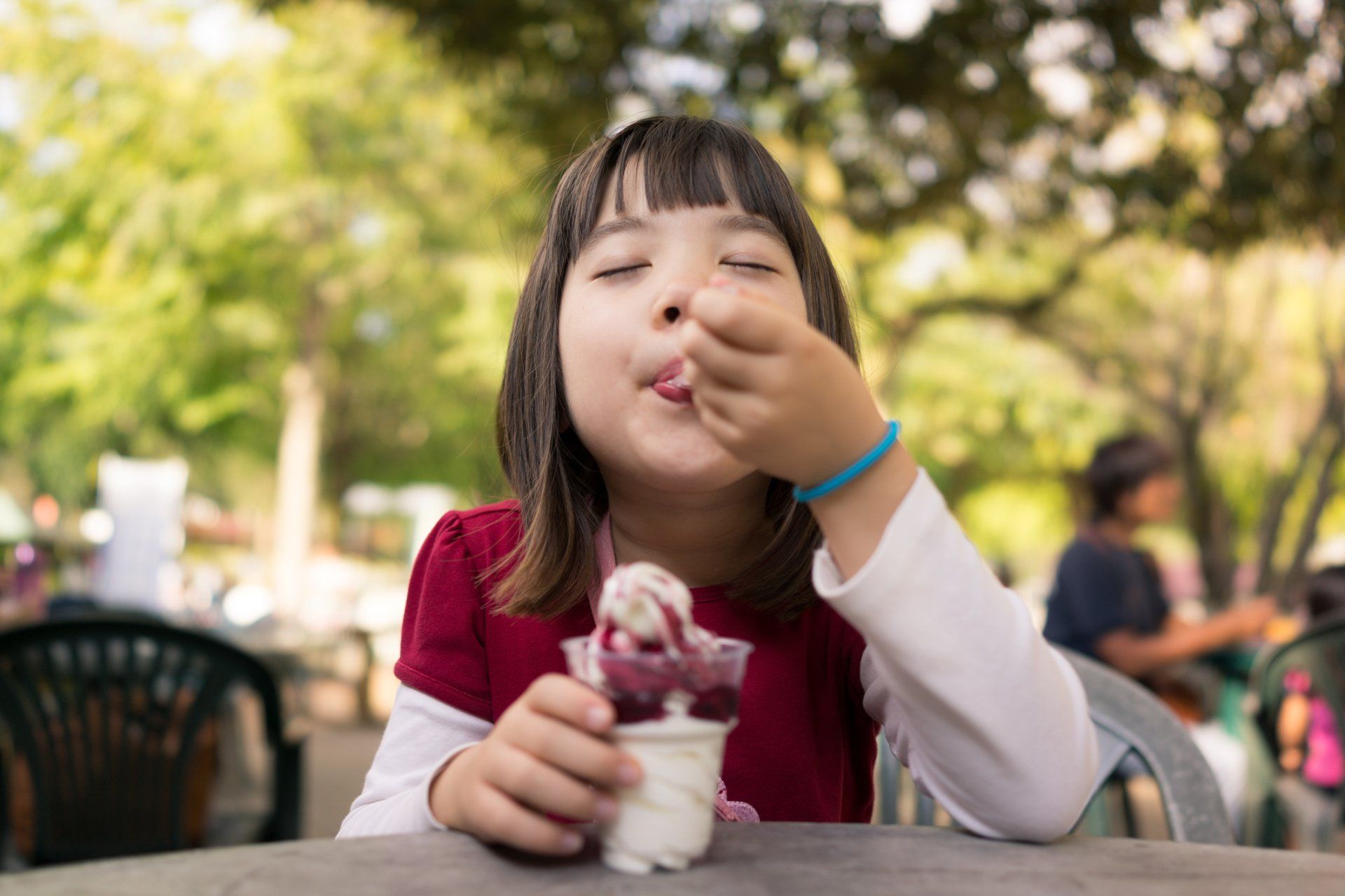 Japanese Girl Eating Ice Cream - Pawcatuck, CT - Mama Emily’s Sweet Treats