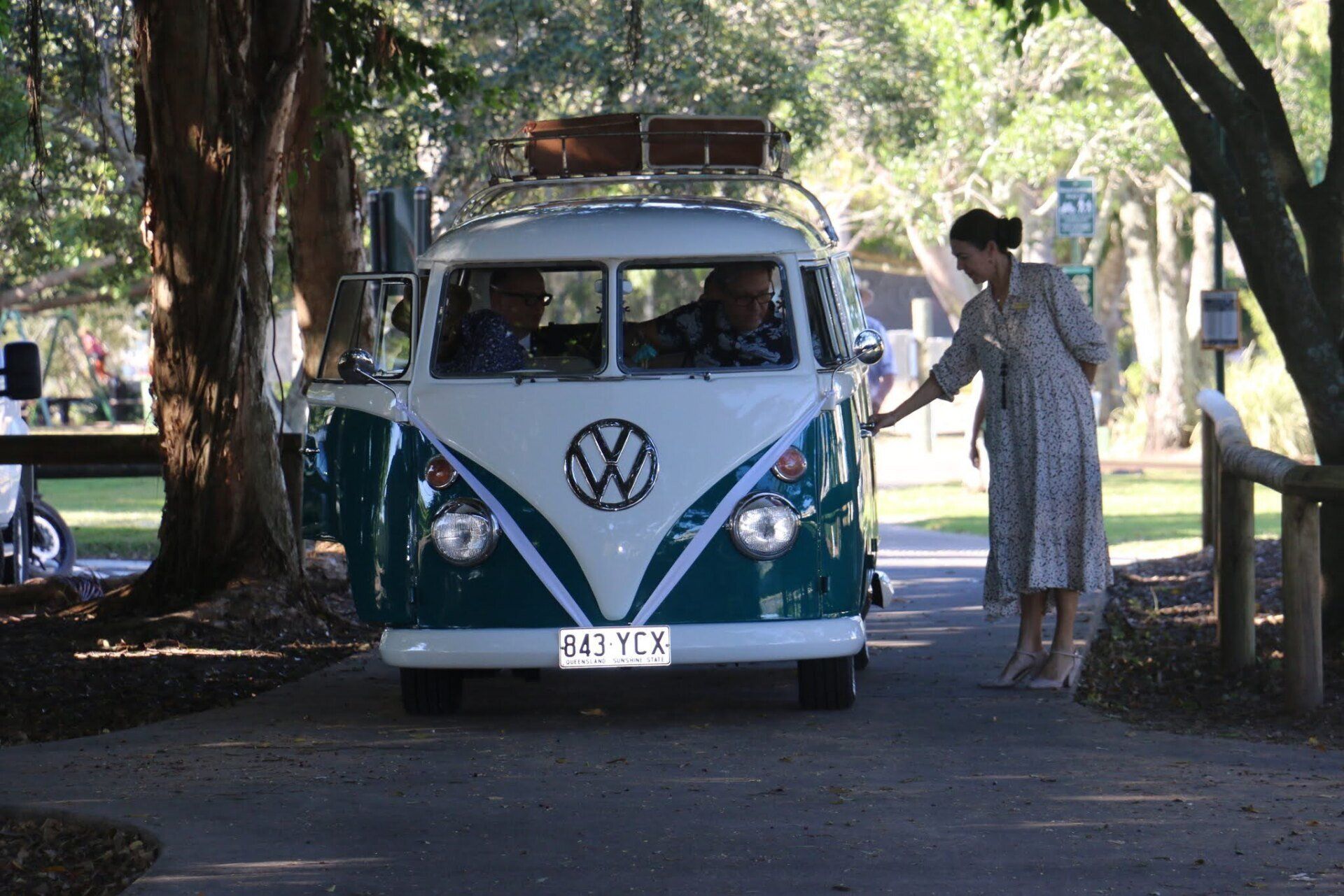 Noosa waterfront wedding for Bryan and Paul, their kombi van arriving