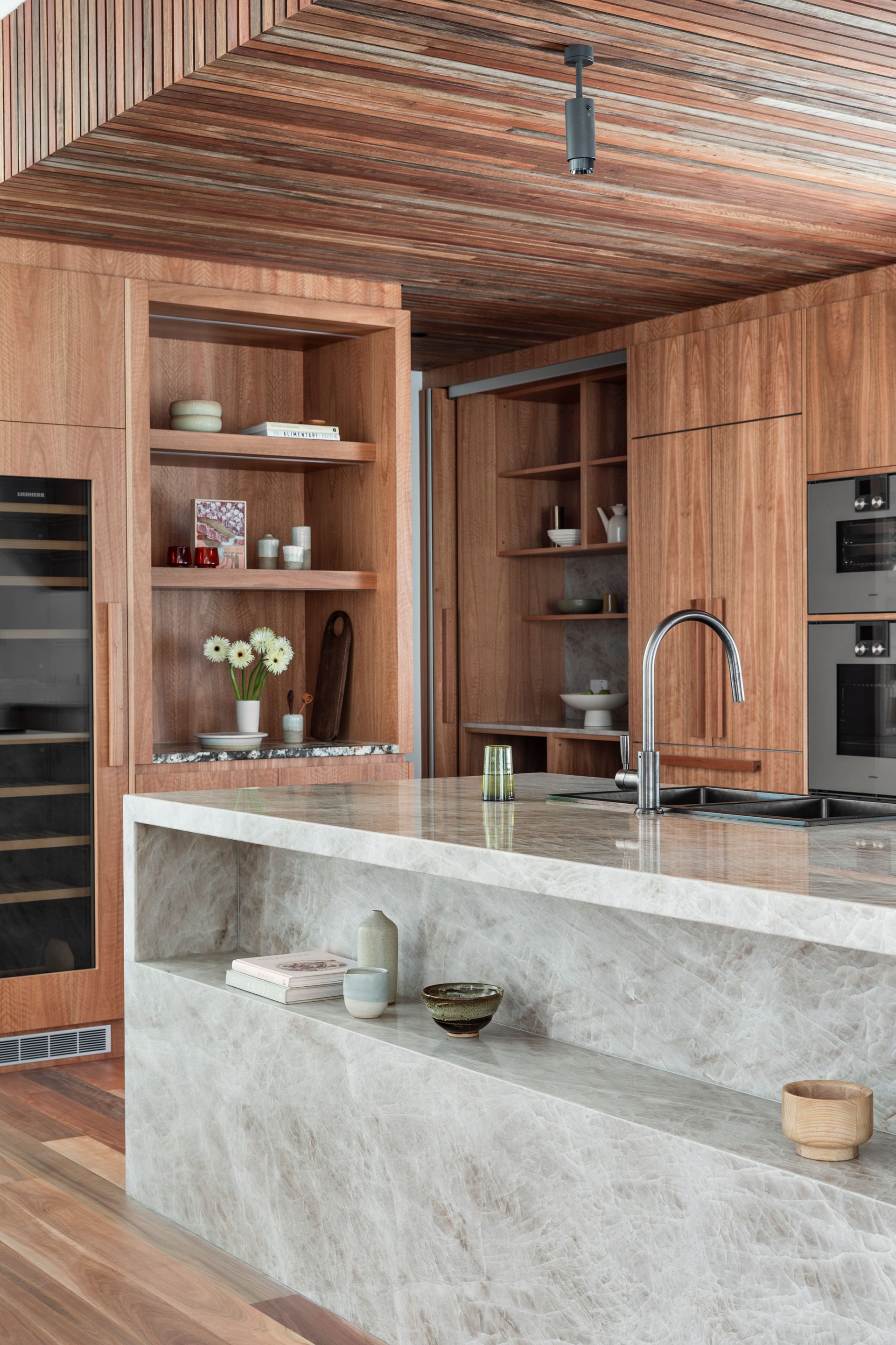 A Kitchen With White Cabinets and Black Tile Floors — Paiano Custom Kitchens In Corrimal, NSW