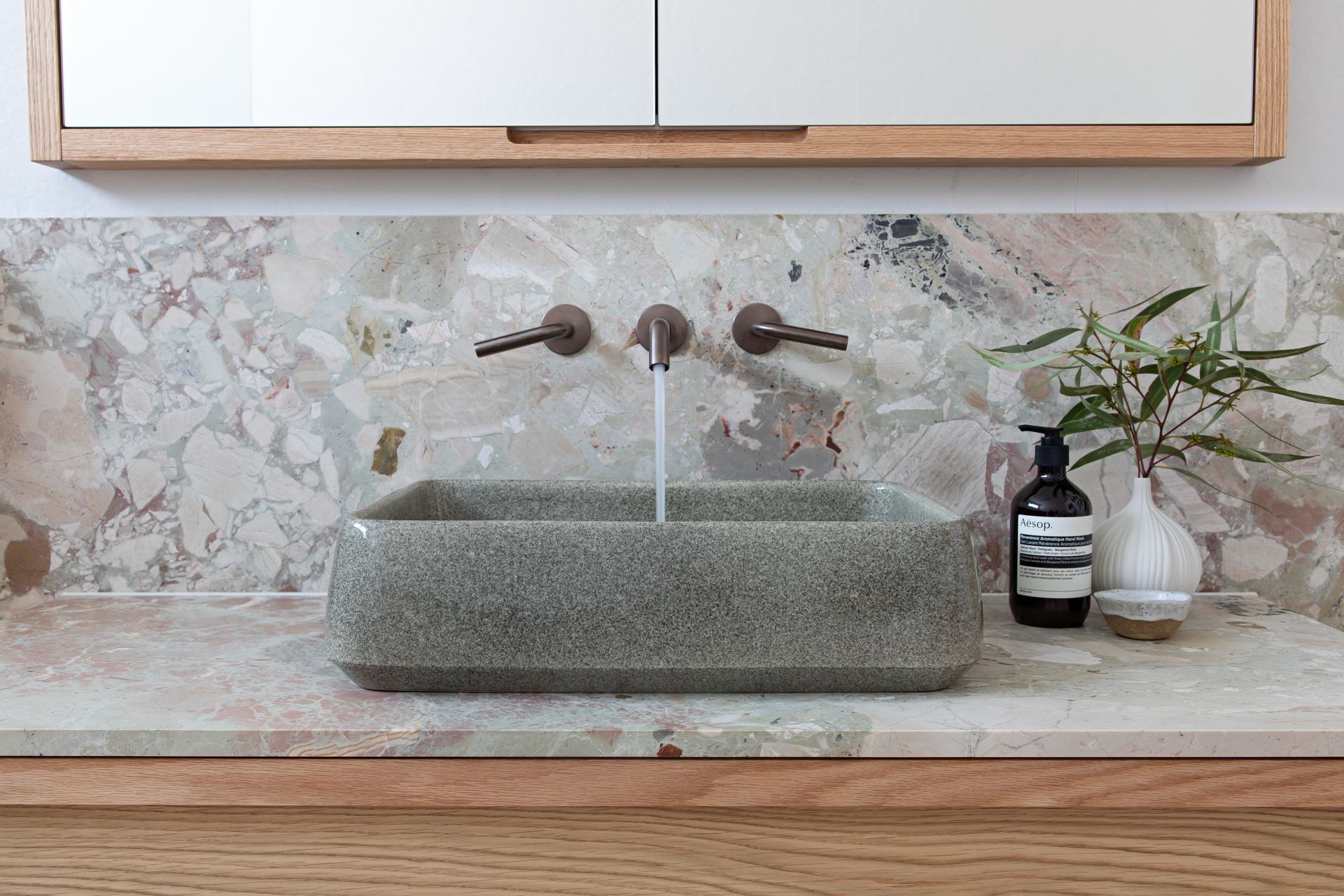A modern laundry with cork walls and ceiling — Paiano Custom Kitchens In Corrimal, NSW