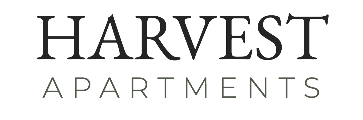Auburn Creek Apartments logo in dark and light gray text.