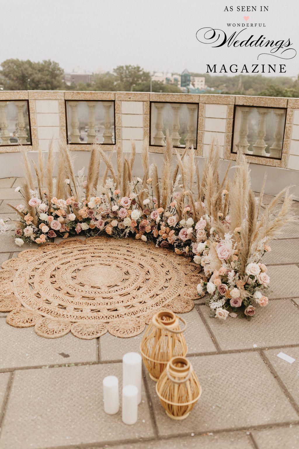 There is a rug with flowers and candles on it.