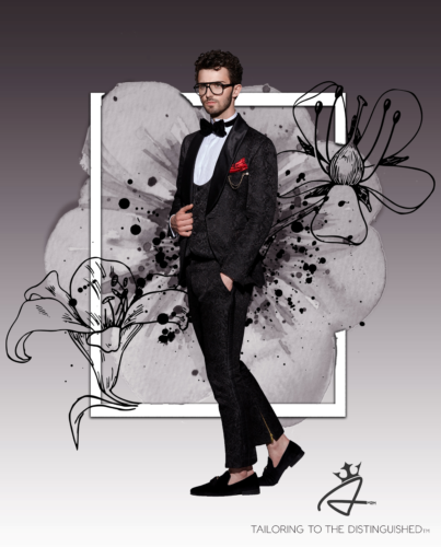 A man in a tuxedo is standing in front of flowers