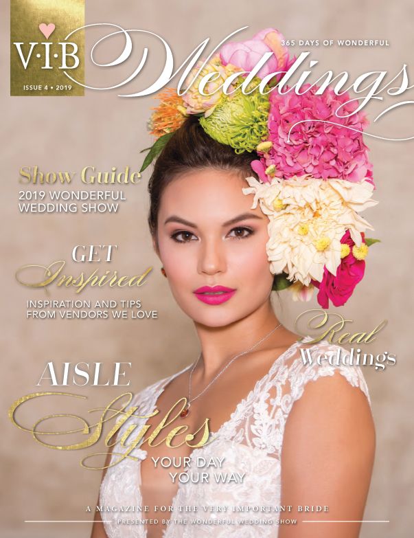 A woman in a wedding dress is on the cover of a wedding magazine.
