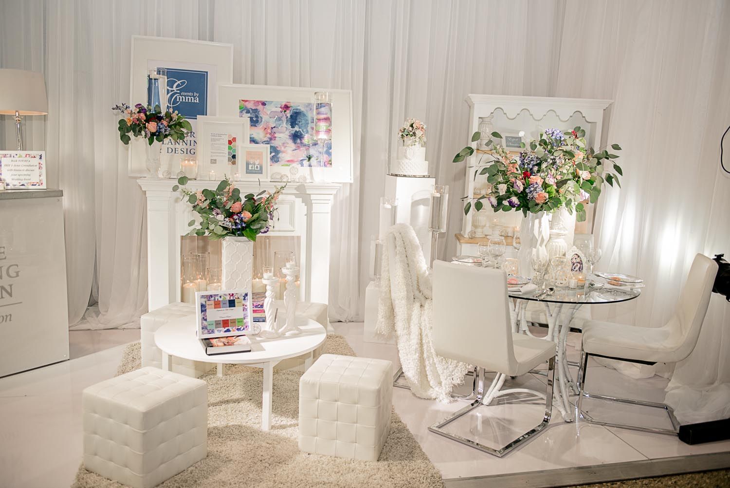 There is a table and chairs in the middle of the room.