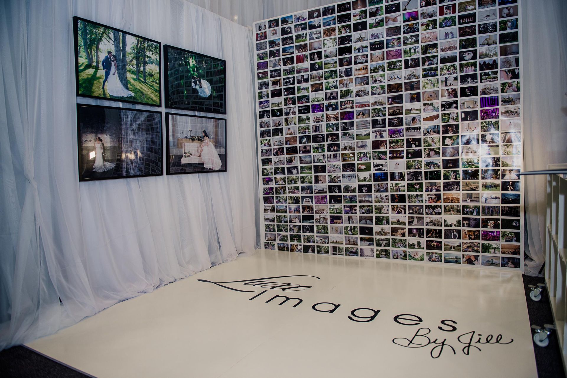 A room with a lot of pictures on the wall and a dance floor.