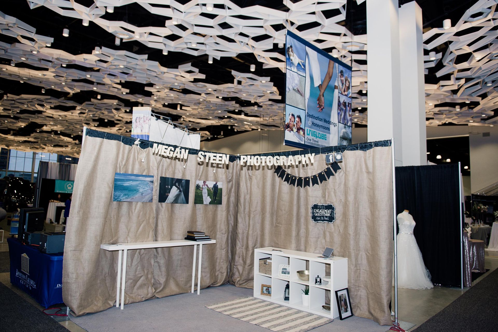 A photo booth with a sign that says steven photography