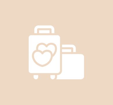 A couple of suitcases with a heart on them.