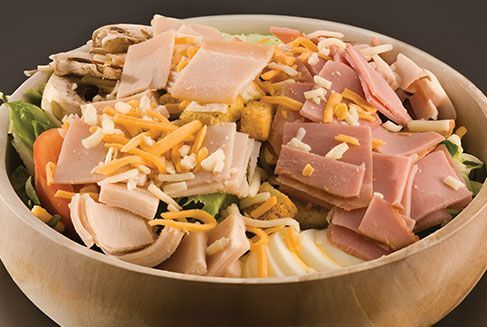 Kansas smokehouse barbecue chef salad with ham, turkey, and cheddar cheese