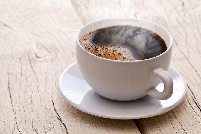 Hot cup of coffee served at smokehouse barbecue restaurant