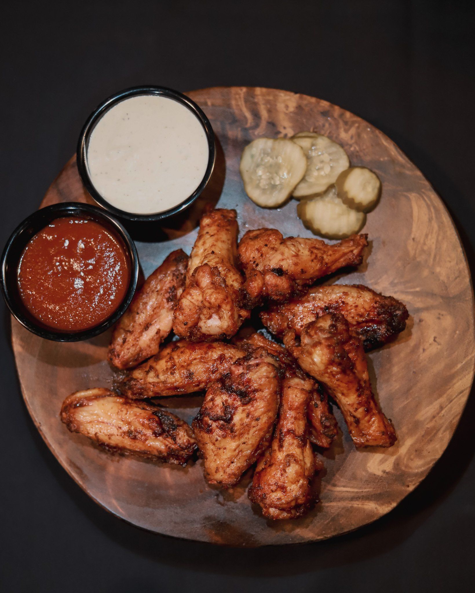 Chicken wings , pickles and sauces near gladstone - Smokehouse bbq restaurant kansas city 