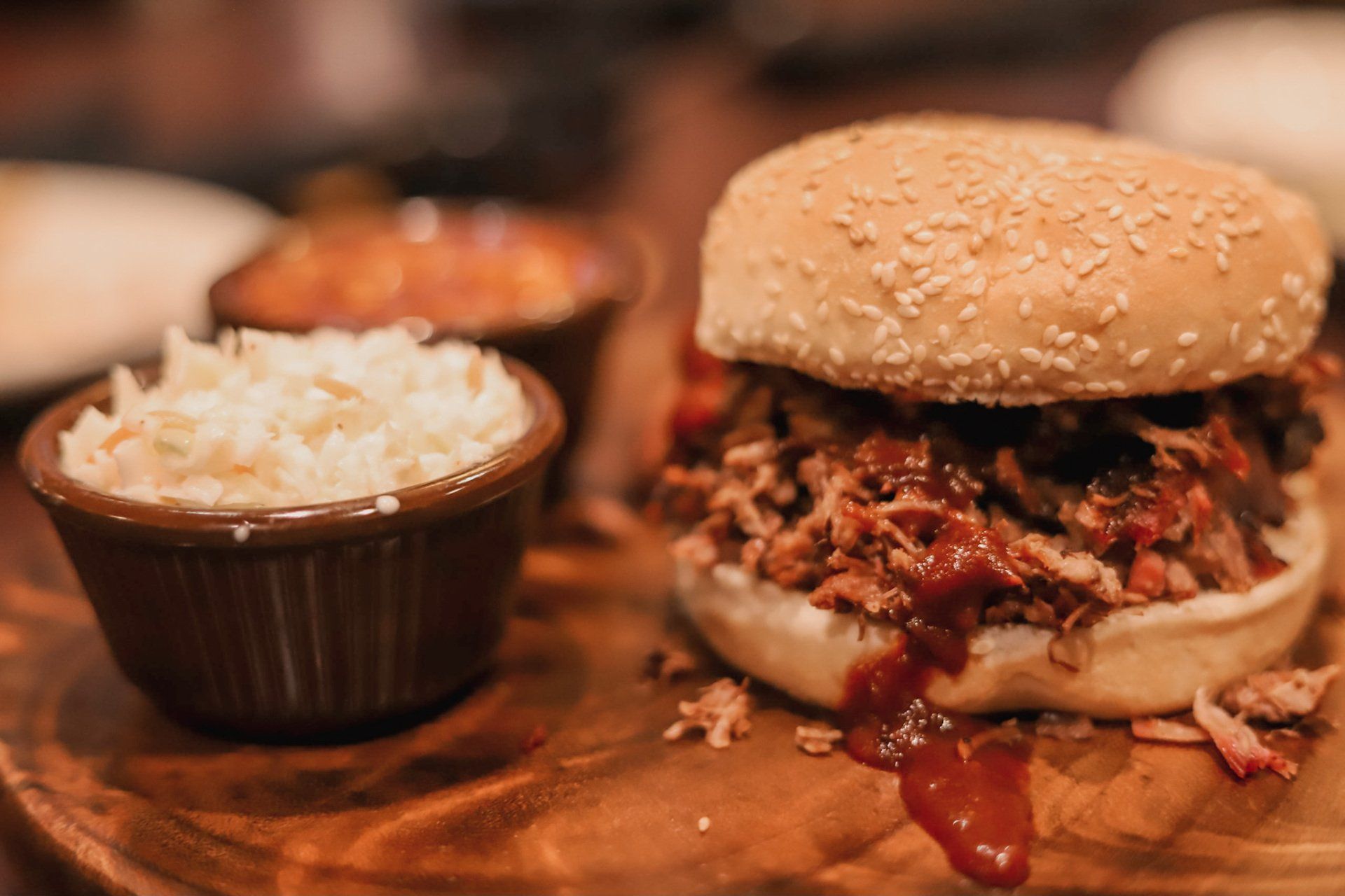 Pork sandwich with coleslaw and ketchup near Independence Mo
