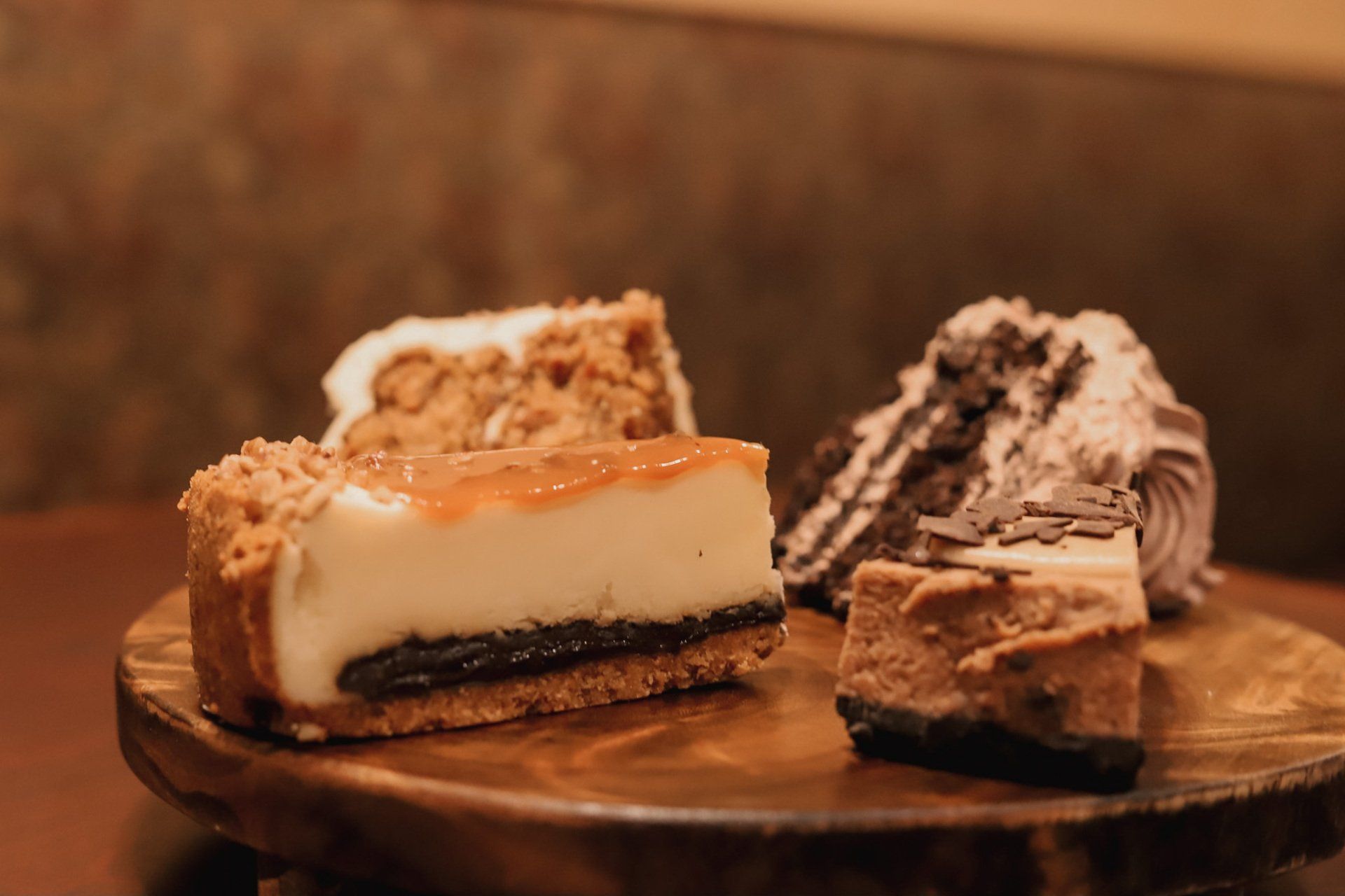 Sliced cakes on round table
