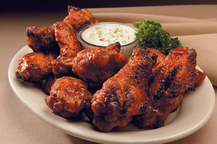 Smokehouse bbq kansas city Chicken wings and a dipping sauce caterer near Kansas