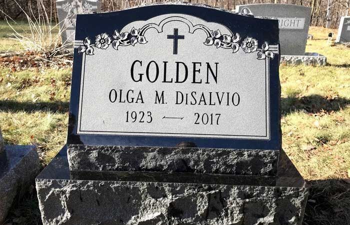 Gravestone for Golden Olga M. DiSalvio, 1923–2017, with cross and floral engraving