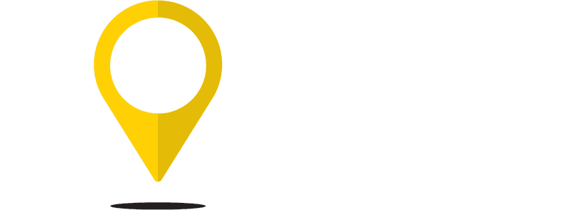 Yellow map pin icon with a white center on a white background