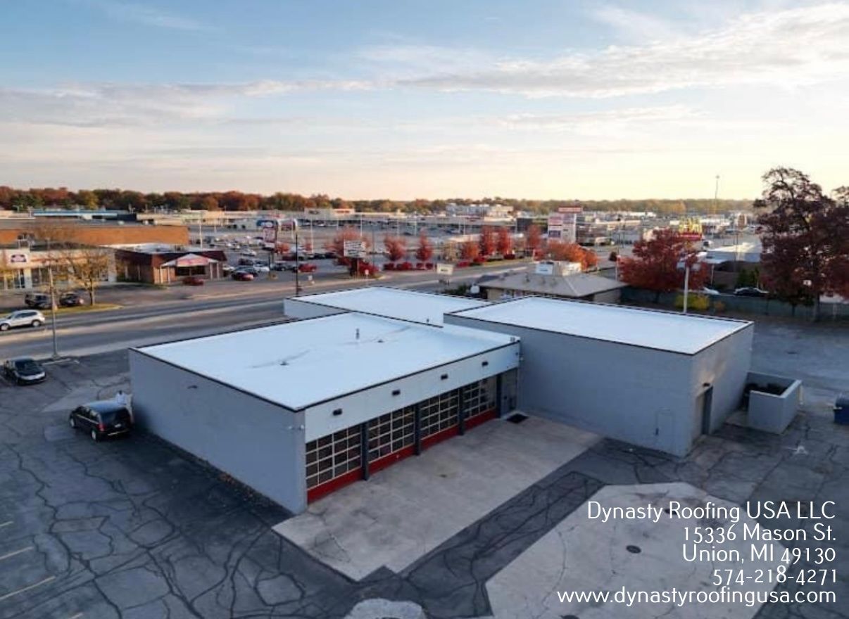 Aerial view of Dynatec Racing USA LLC. A gray building with red-trimmed doors and a flat roof sits in Union, MI.