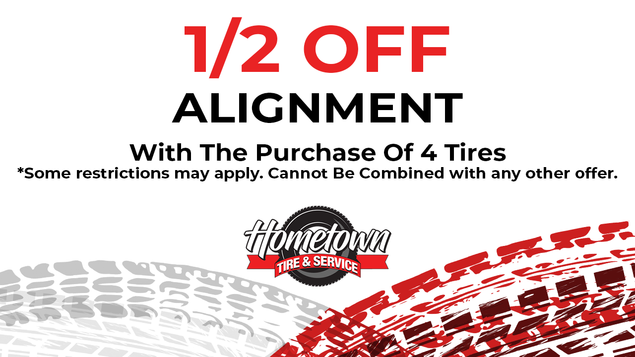 1/2 off alignment with purchase of 4 tires; red and black promotional graphic with tire tracks