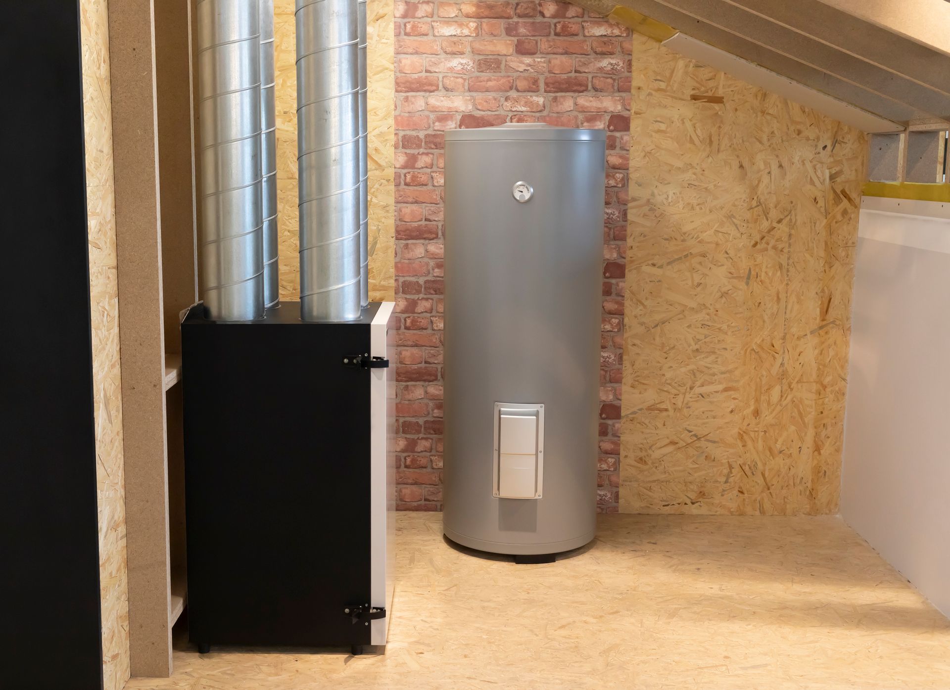 Fixing Water Heater — Norwood, MA — Norfolk County Plumbing & Heating Fixing Water Heater — Norwood, MA — Norfolk County Plumbing & Heating