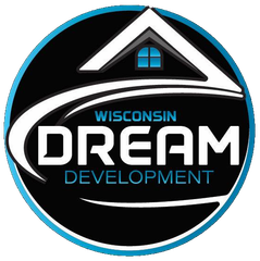 Logo for Wisconsin Dream Development: a circular emblem with a house outline, a blue window, and white and blue text.