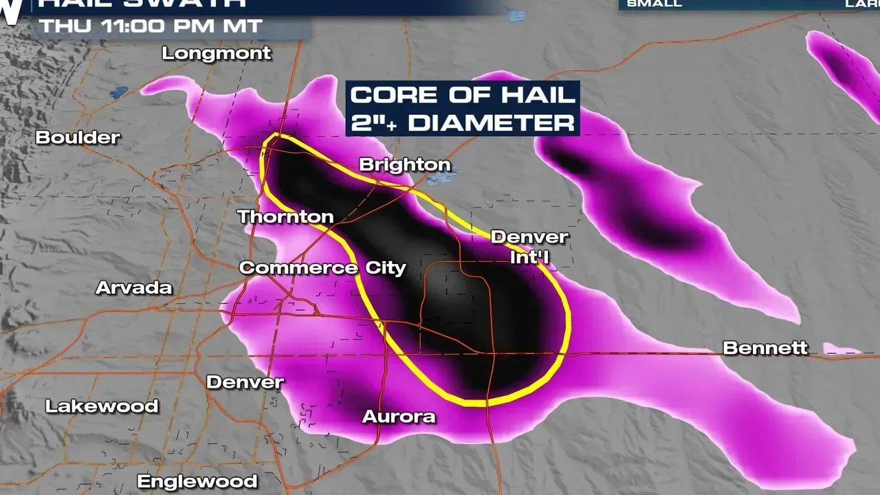 Weather radar map of Aurora, Colorado, showing a large magenta hail core over the city and nearby areas.