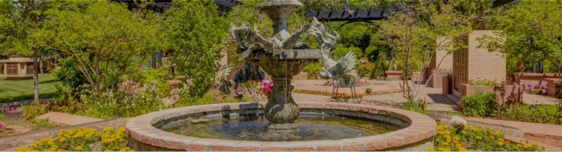 Sculpted fountain and seating in memorial garden