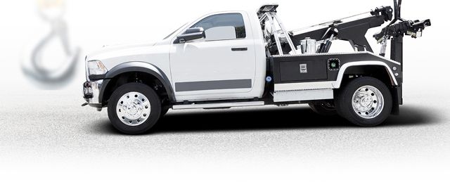White tow truck with a black flatbed on a white background | Mario’s Automotive