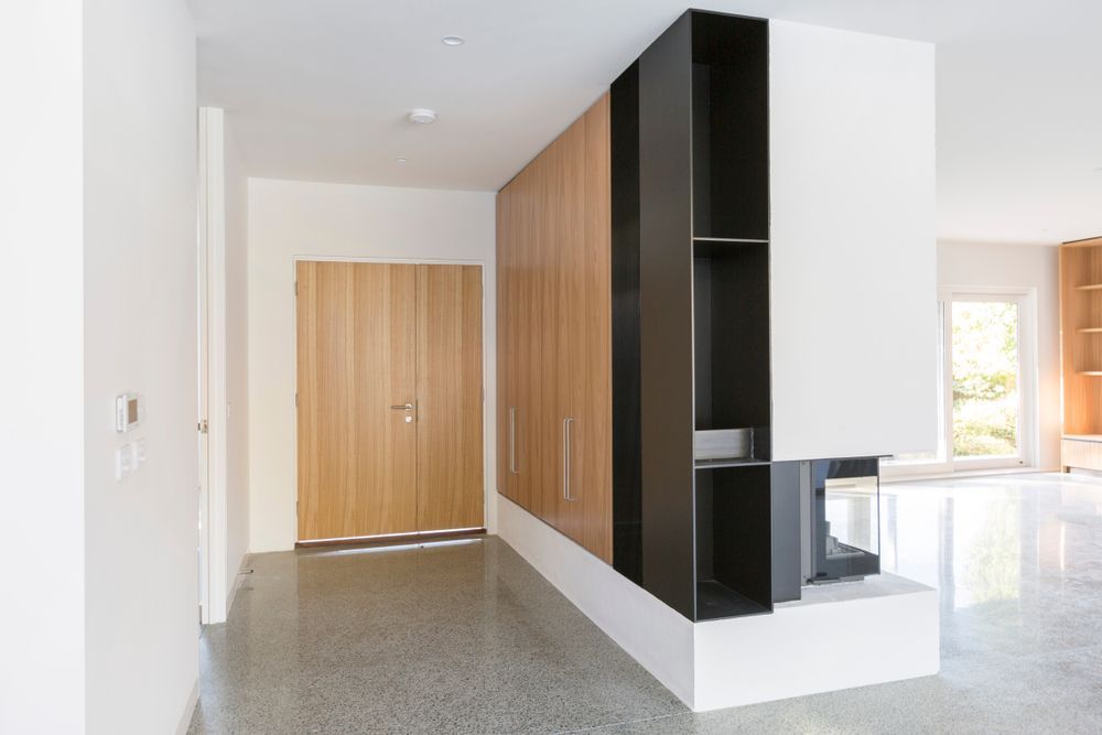 Modern Hallway With Wood-paneled Wall, Black Shelving — Working Windows in Noosa Heads, QLD