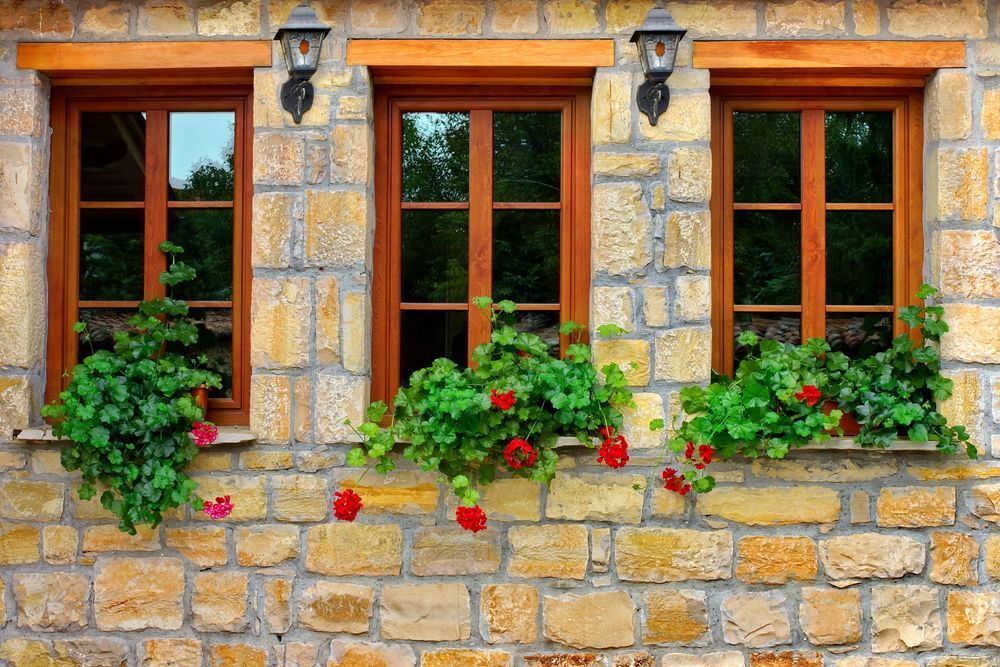 Stone House Facade With Three Wooden Windows — Working Windows in Buderim, QLD