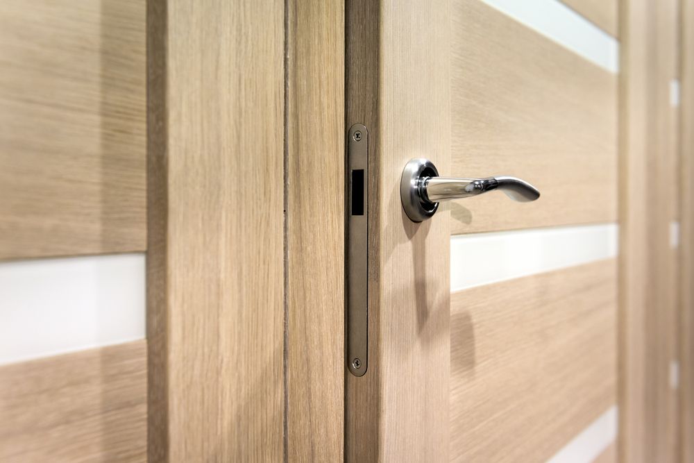 Close-up of a Modern Light-wood Interior Door With Horizontal White Panels — Working Windows in Caloundra, QLD