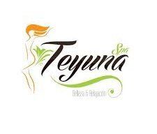 Un logotipo para un spa con una mujer y una planta.