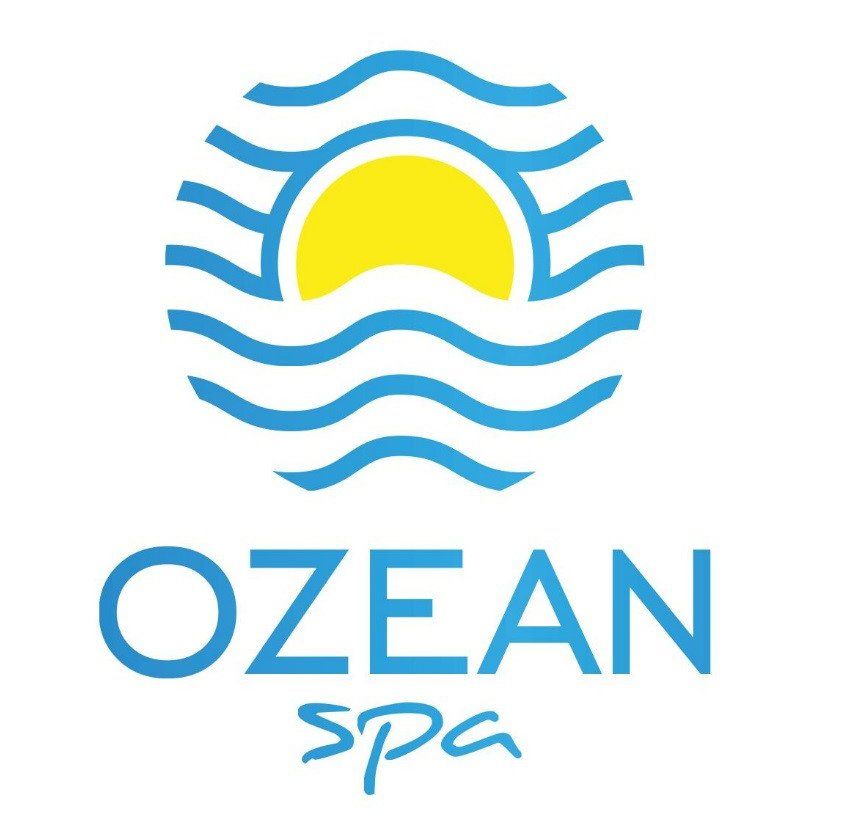 Un logotipo azul y amarillo para Ozean Spa.