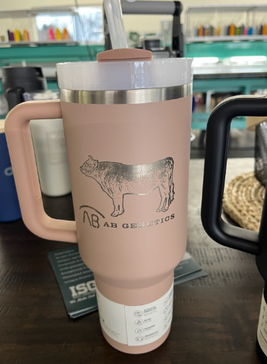 Pink insulated tumbler with handle and straw, etched dog graphic, 