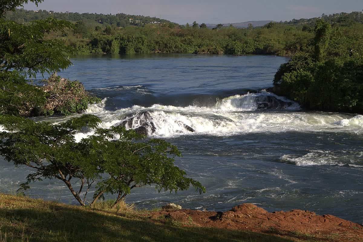 A river with a waterfall in the middle of it