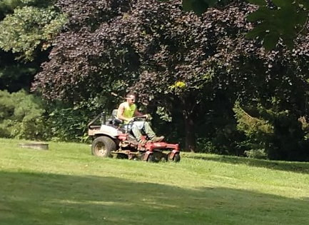 Man riding a lawn mower
