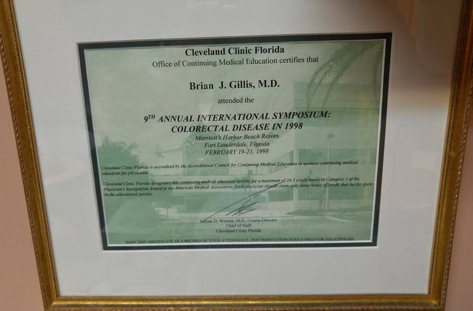 A framed certificate from the 9th annual international symposium