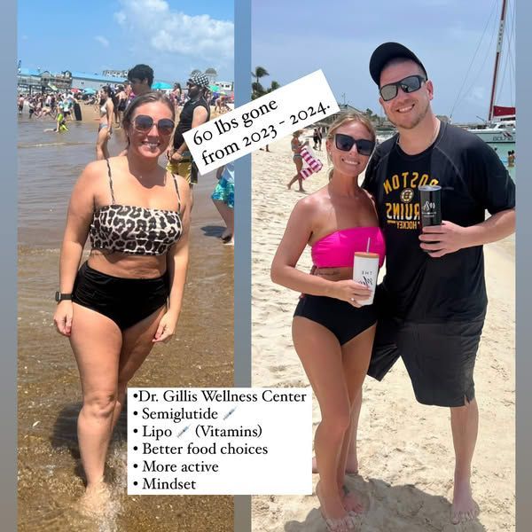 A man and a woman are standing on a beach.