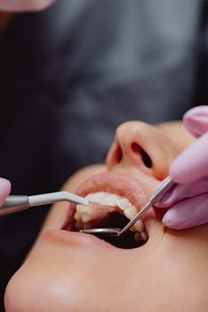 Gum recession exposes tooth roots causing sensitivity and aesthetic concerns. Learn what causes receding gums and how to treat and prevent further loss in Kuwait.