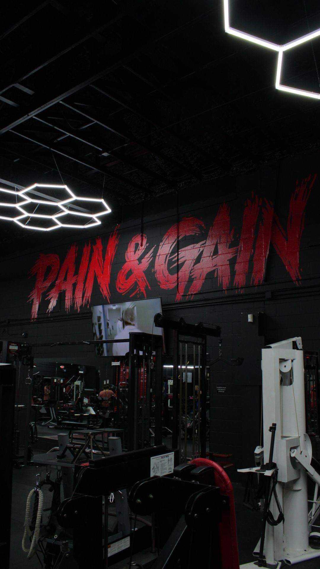 Dark gym interior with red 